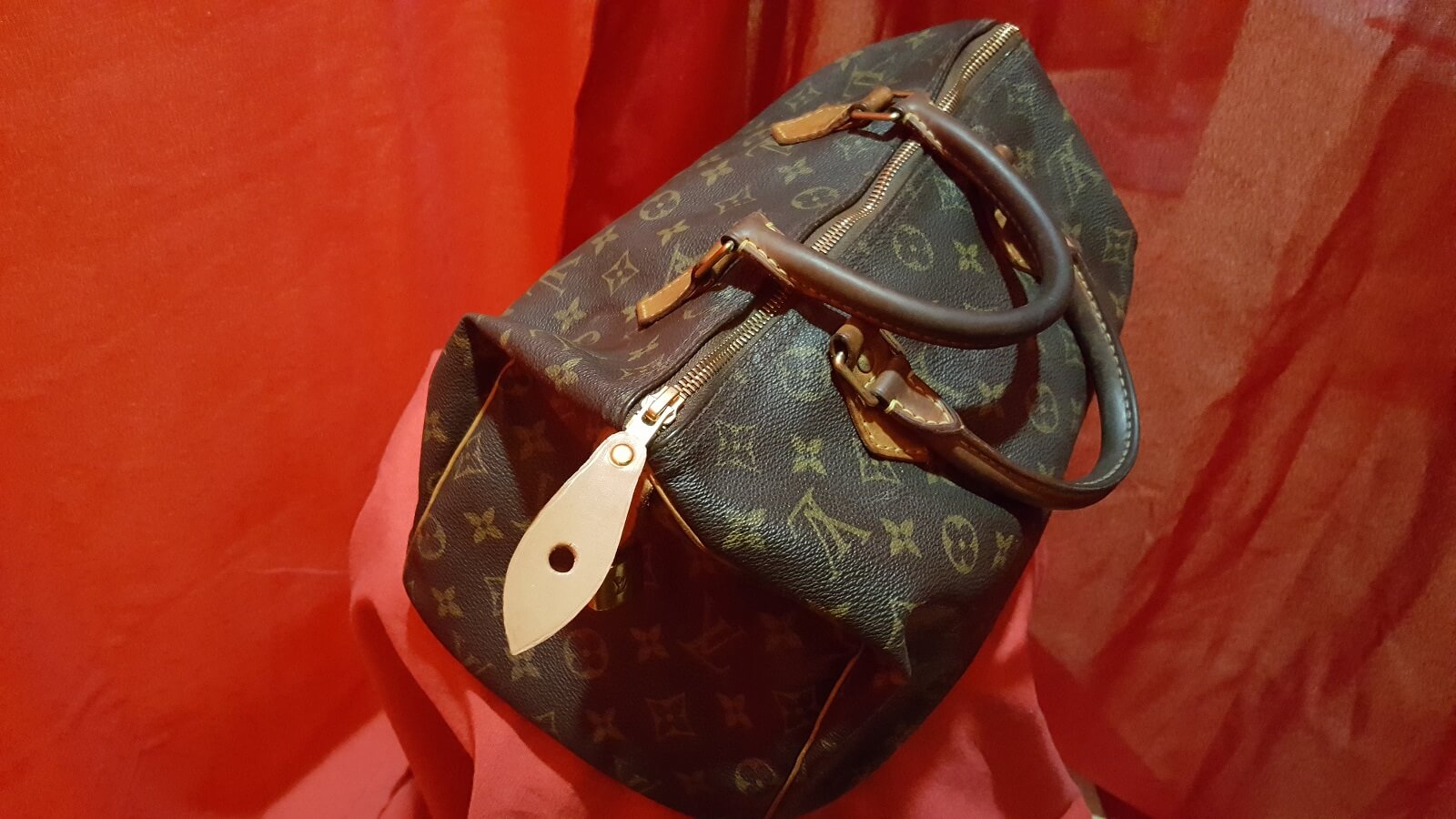 riparazione cerniera louis vuitton